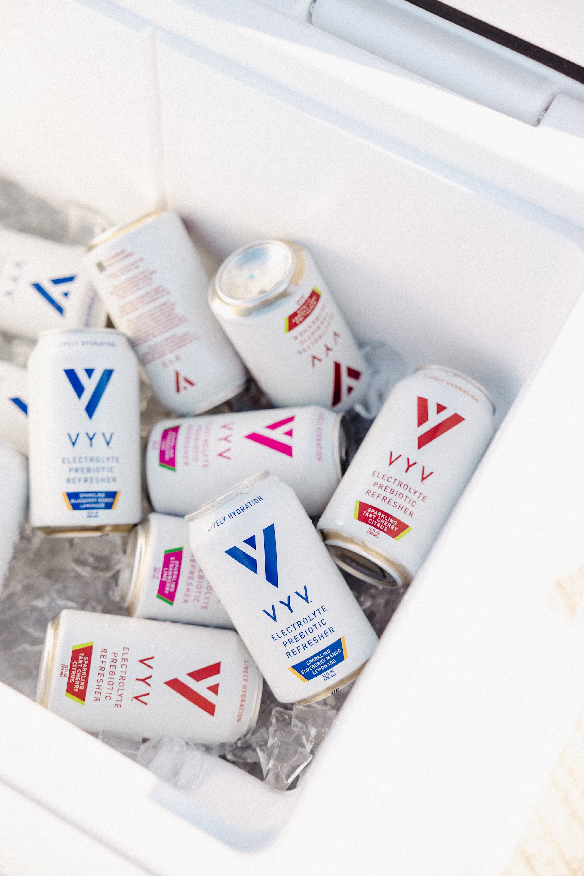 VYV Hydration cans on ice in a cooler